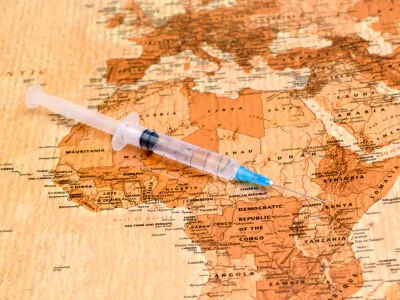 Kaart van Afrika en een injectiespuit